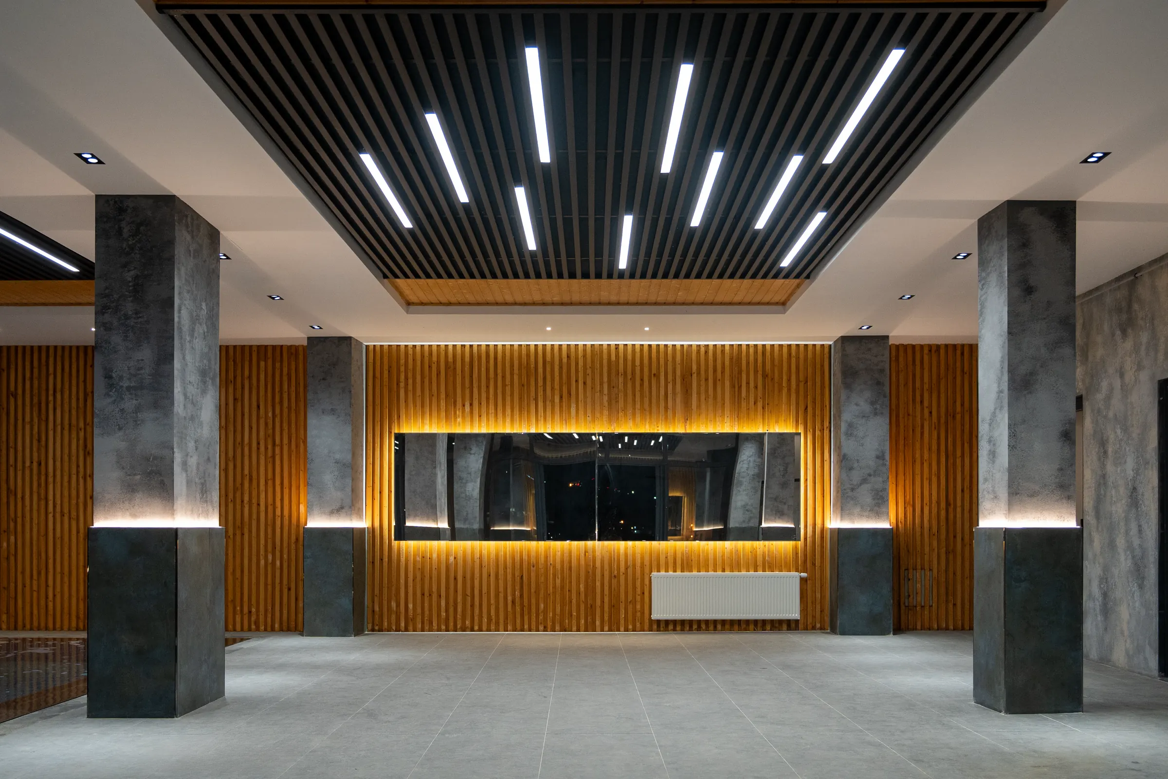 Clean commercial building lobby with polished floors after janitorial service