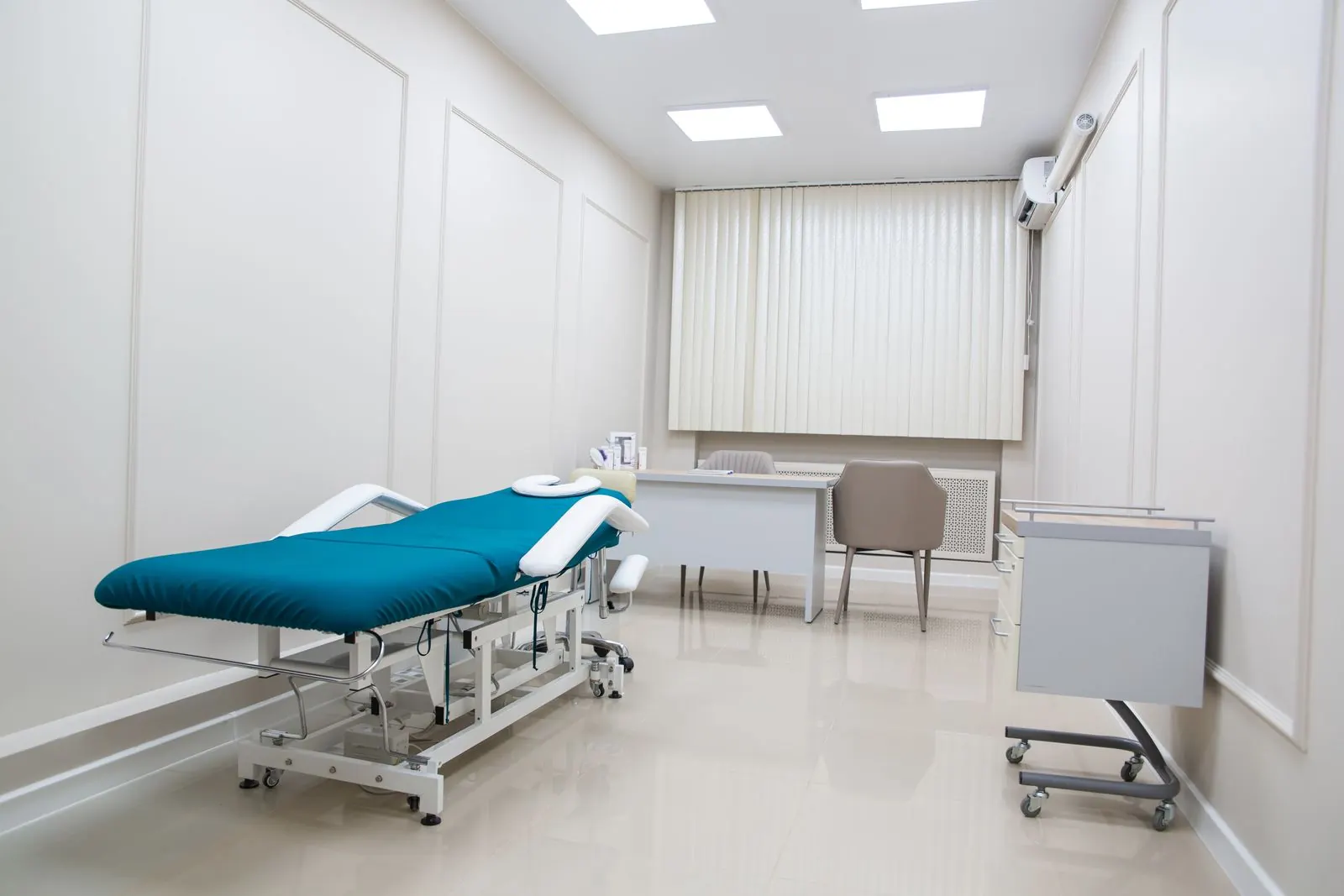 Spotless medical exam room with a cleaned exam table and floor